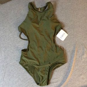 Strappy one piece bathing suit